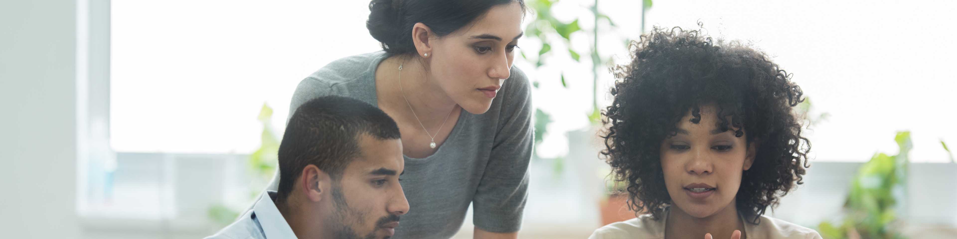 three mortgage loan officers talking