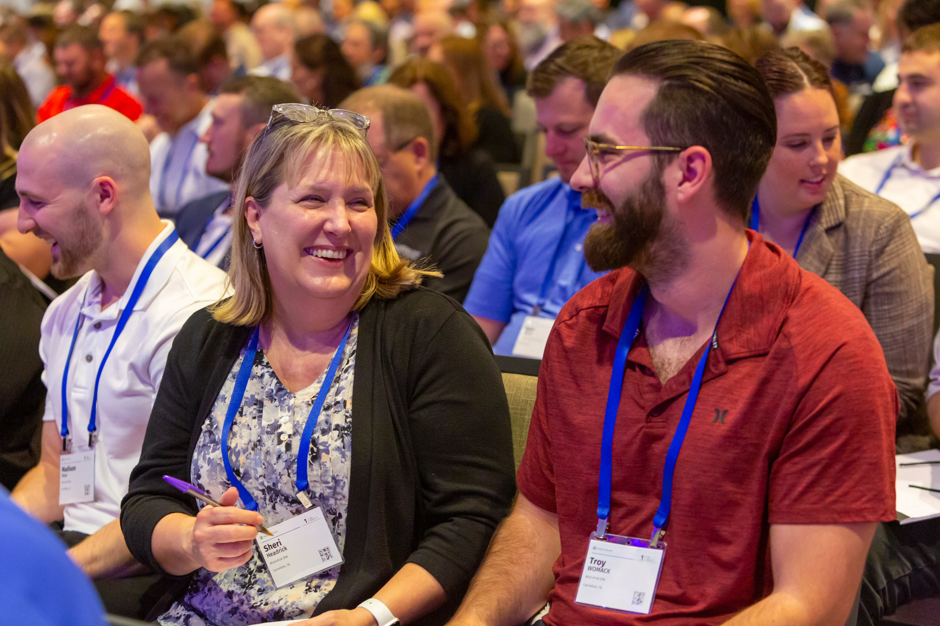 CCH User Conference attendees talking at show