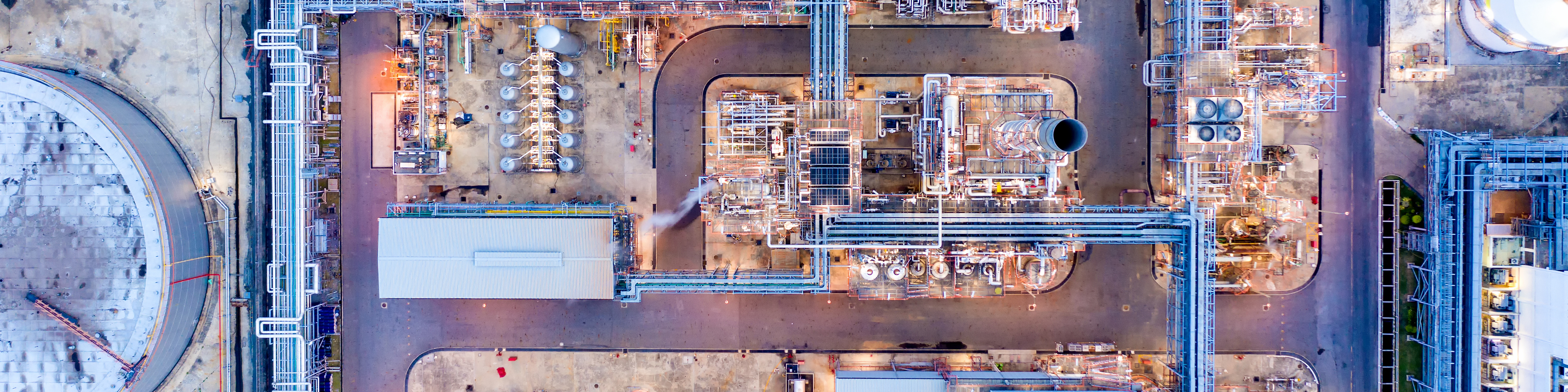 Aerial view of twilight of oil refinery ,Shot from drone of Oil refinery plant ,refinery Petrochemical plant at dusk , Bangkok, Thailand.