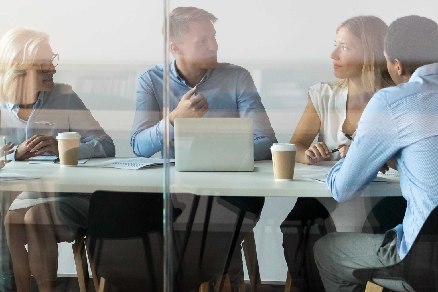 Group meets at conference table