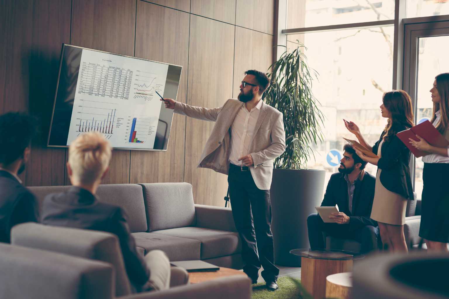 Man leads group with presentation