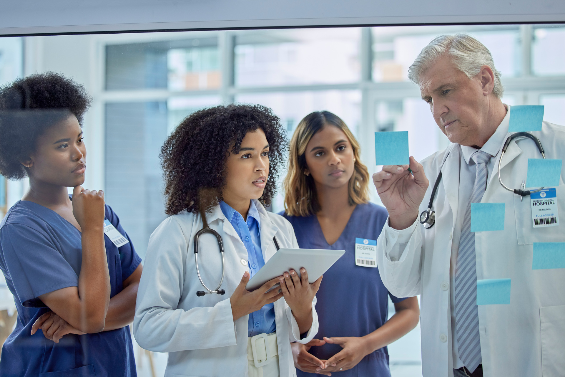 Medical professionals gathered to discuss plans and patient care