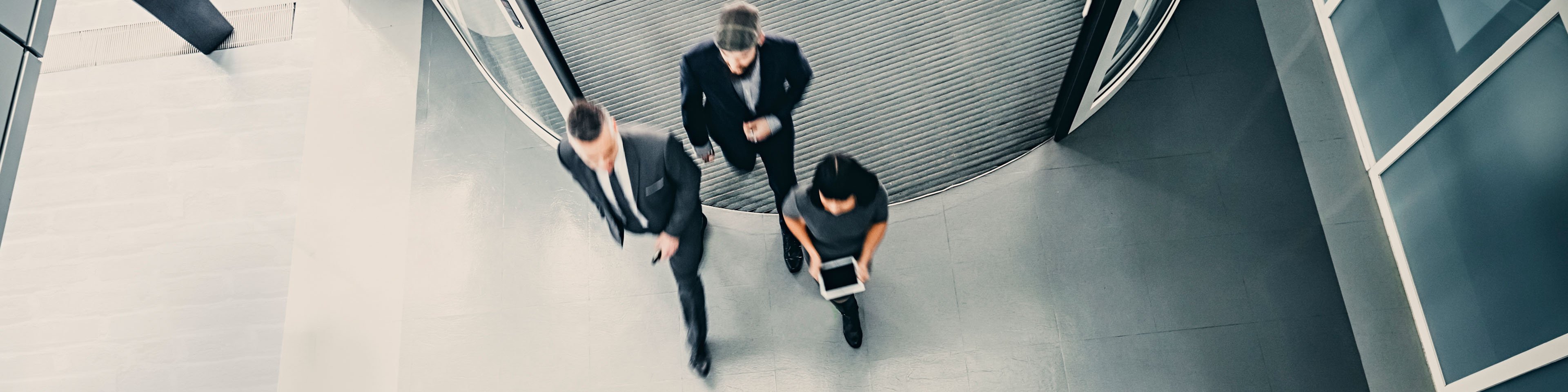 group of business people entering the lobby