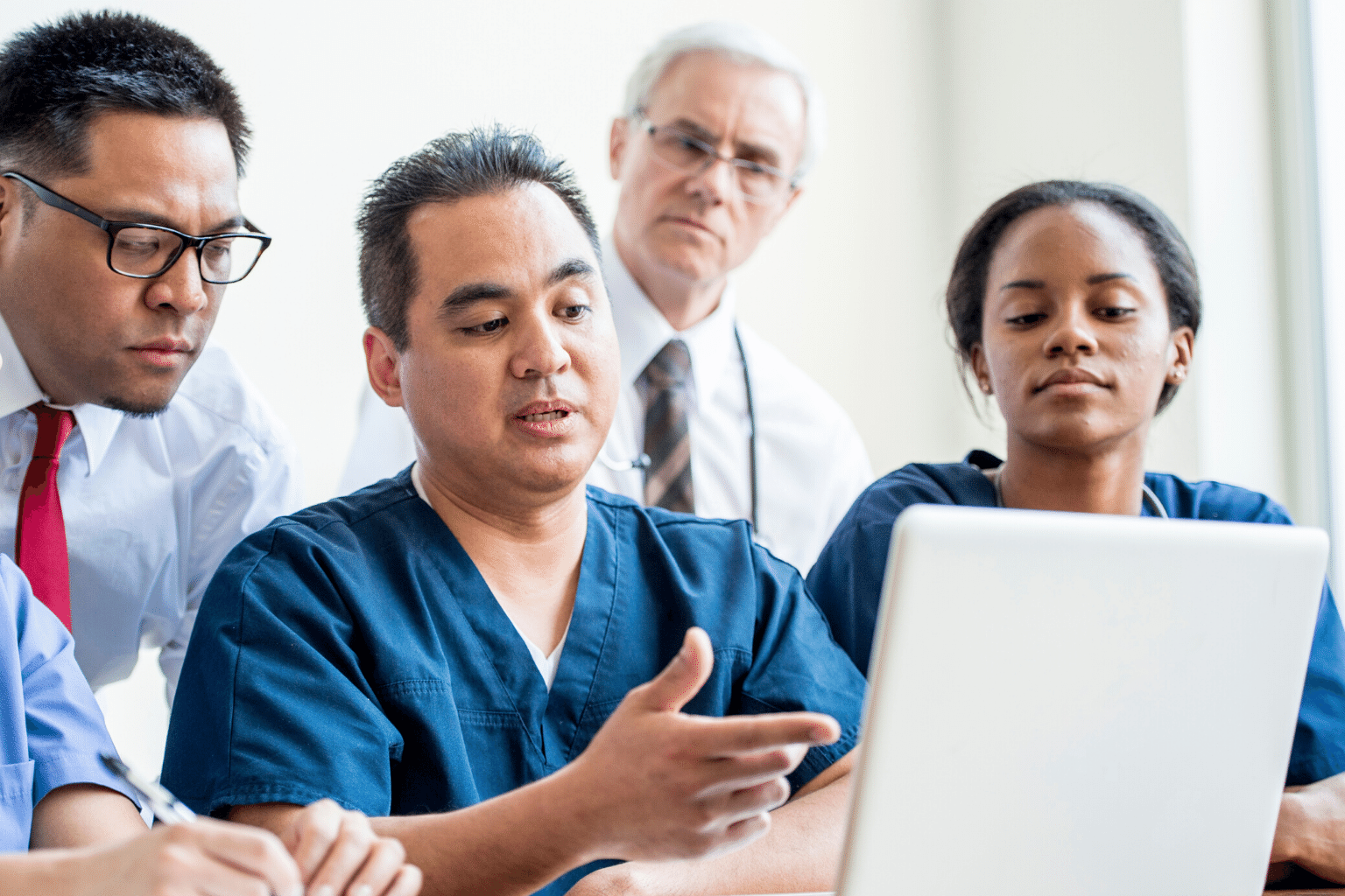 Clinical team discussing program results