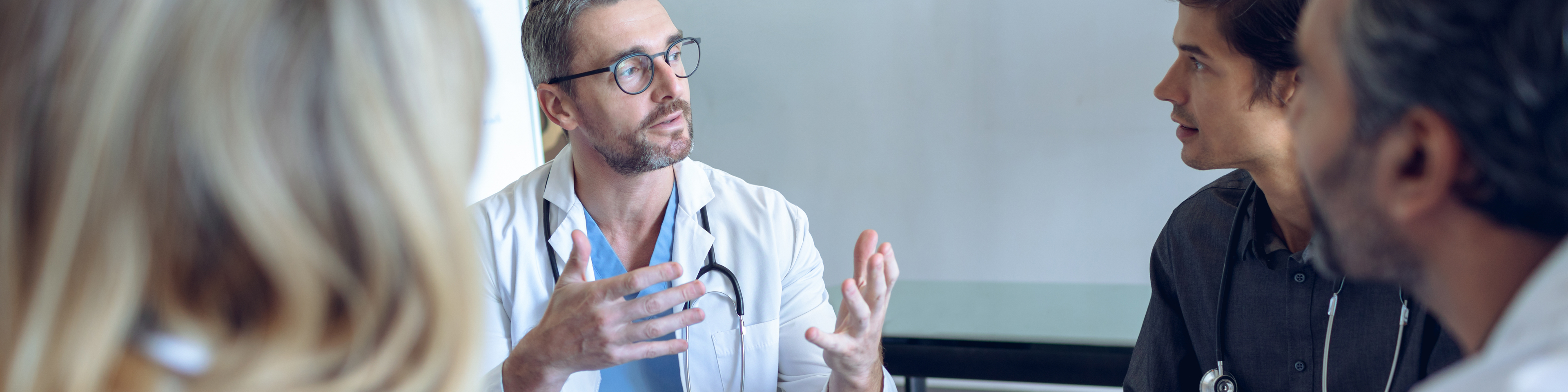 Medical team discussing with each other in a hospital