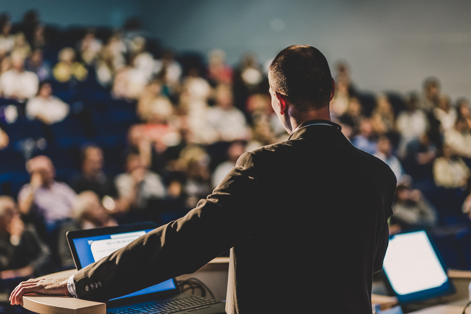 Crown Man talking audience conference