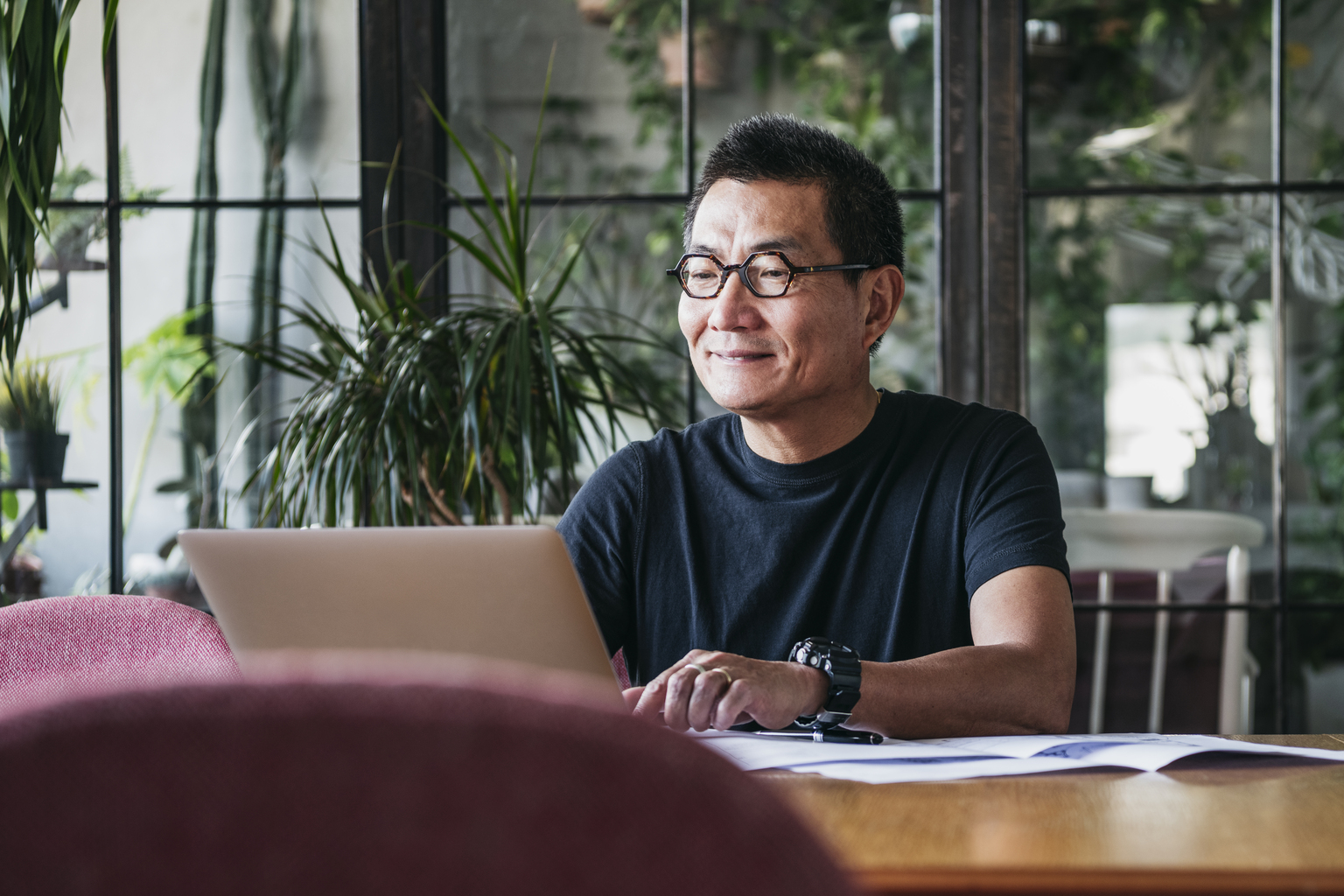 Man using his home space to work remotely from home