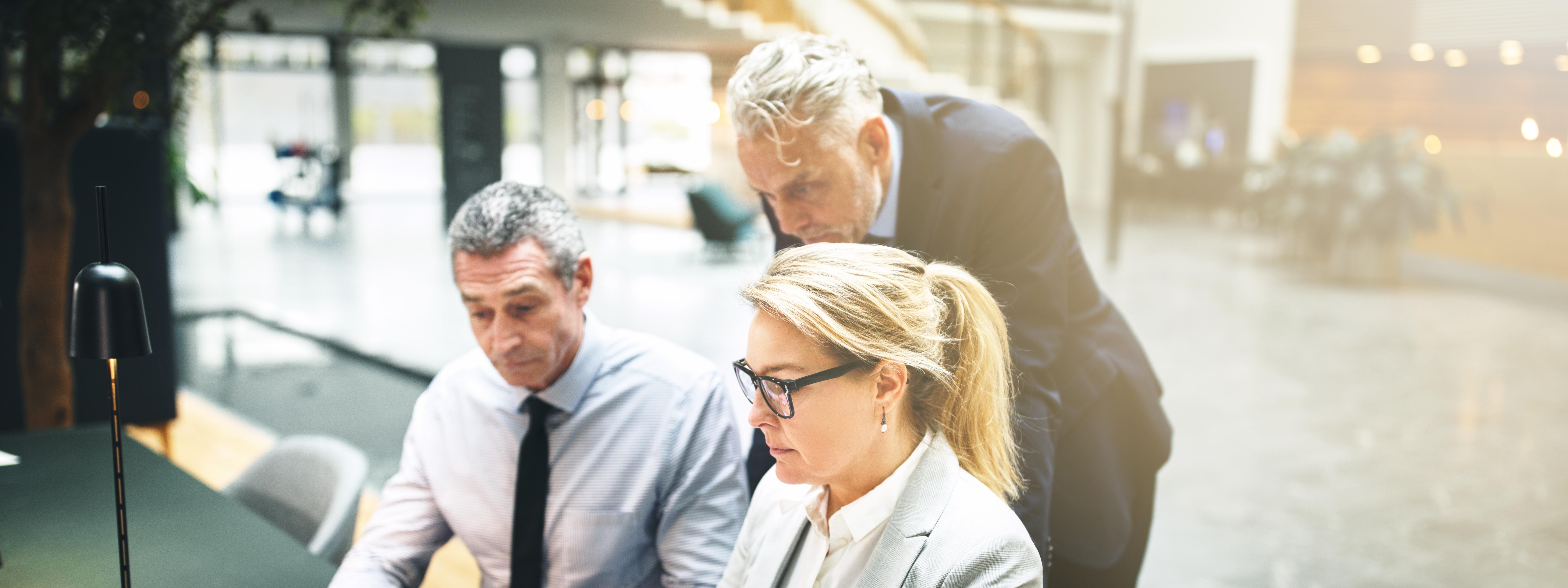 Business people discussing at workplace.