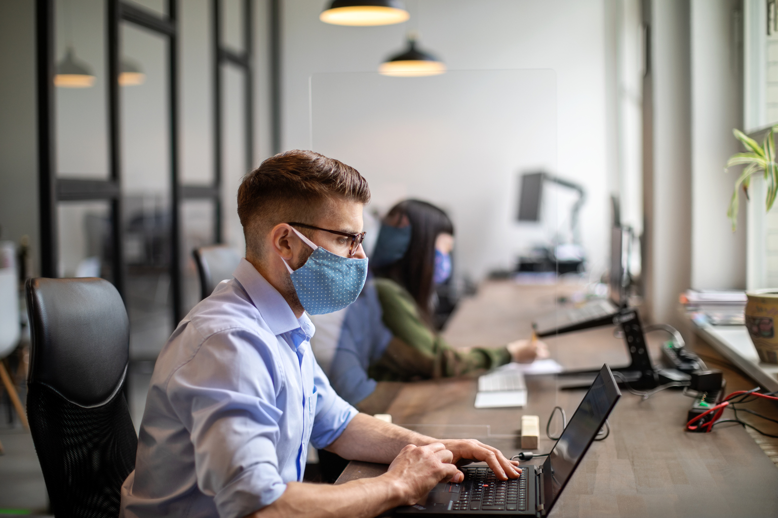 People Working in Mask at Office keeping 6 feet distance