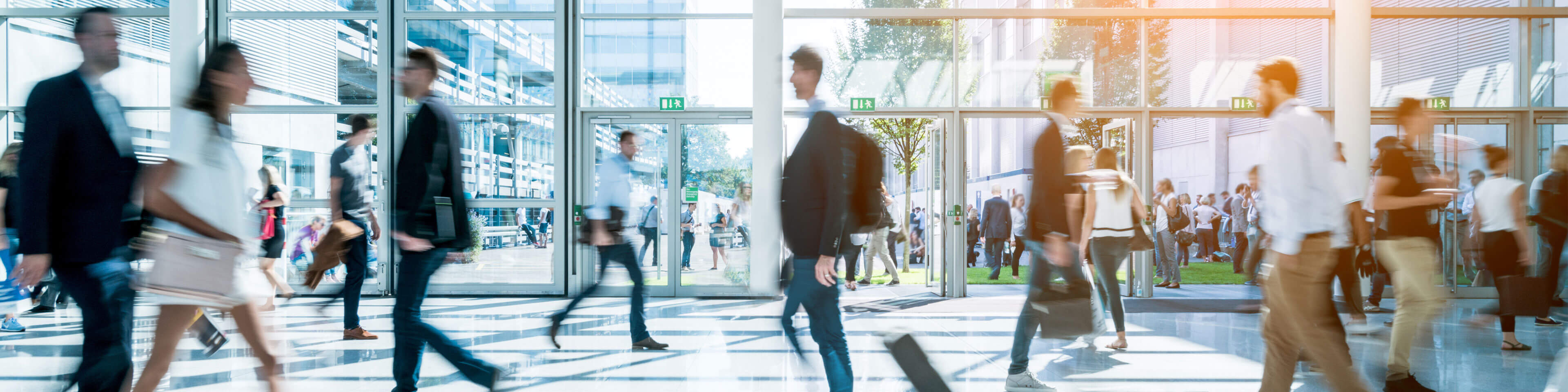 businesspeople walking, slightly out of focus and blurry