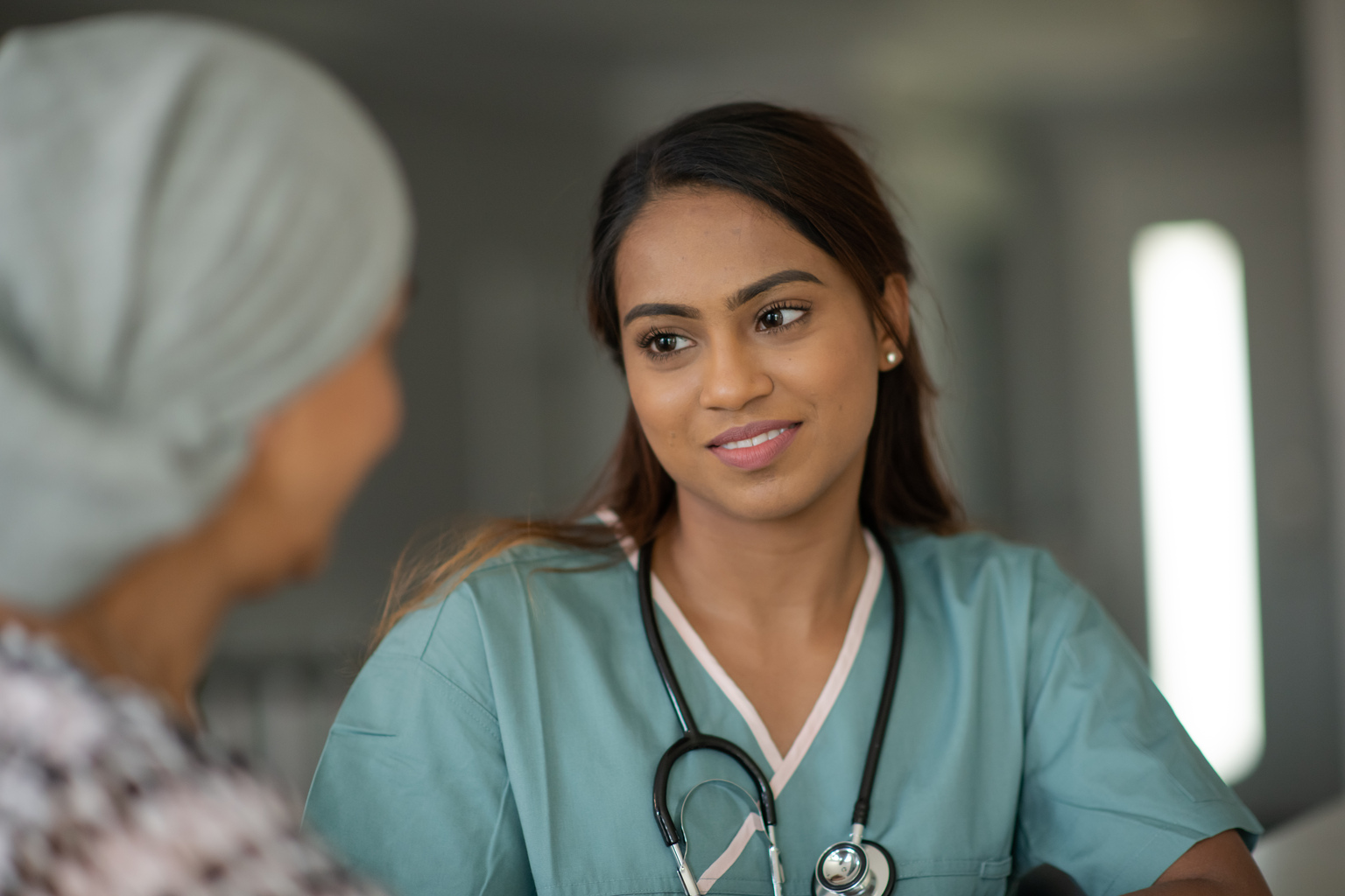 Senior Oncology Patient Consults with her Female Doctor