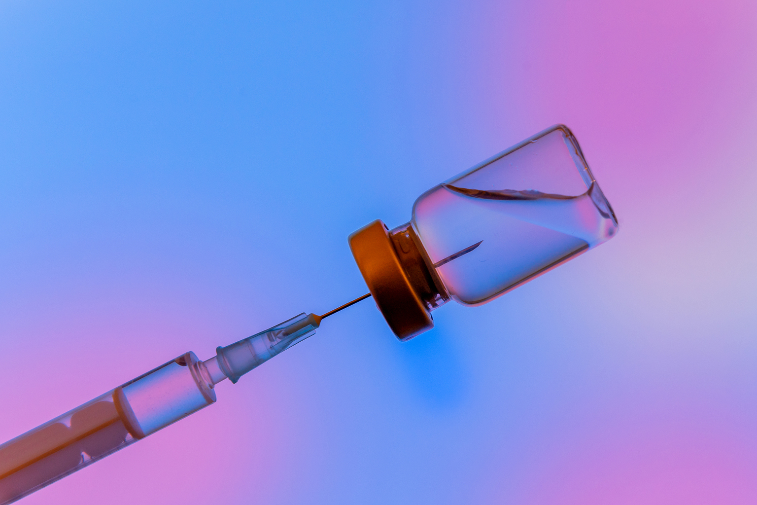 Close-up medical syringe with a vaccine