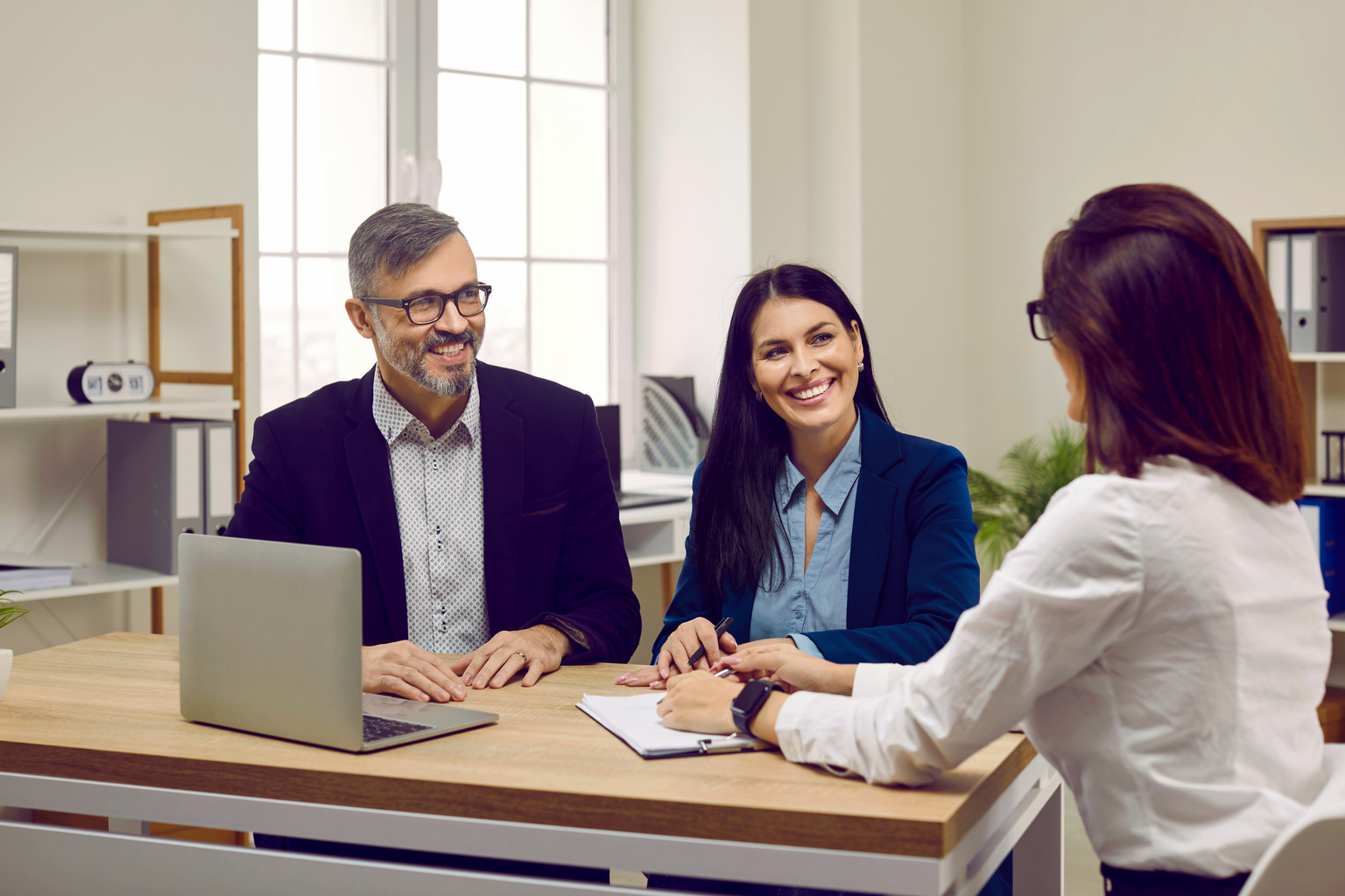 Couple meeting real estate, bank worker or loan broker agent