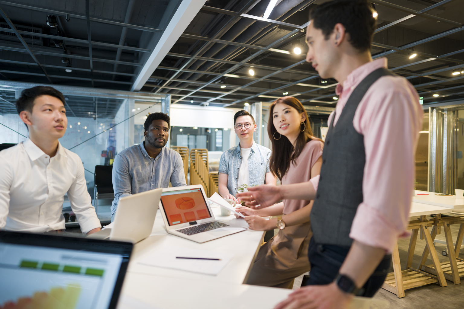 Young multi ethnic-group of people working in modern office