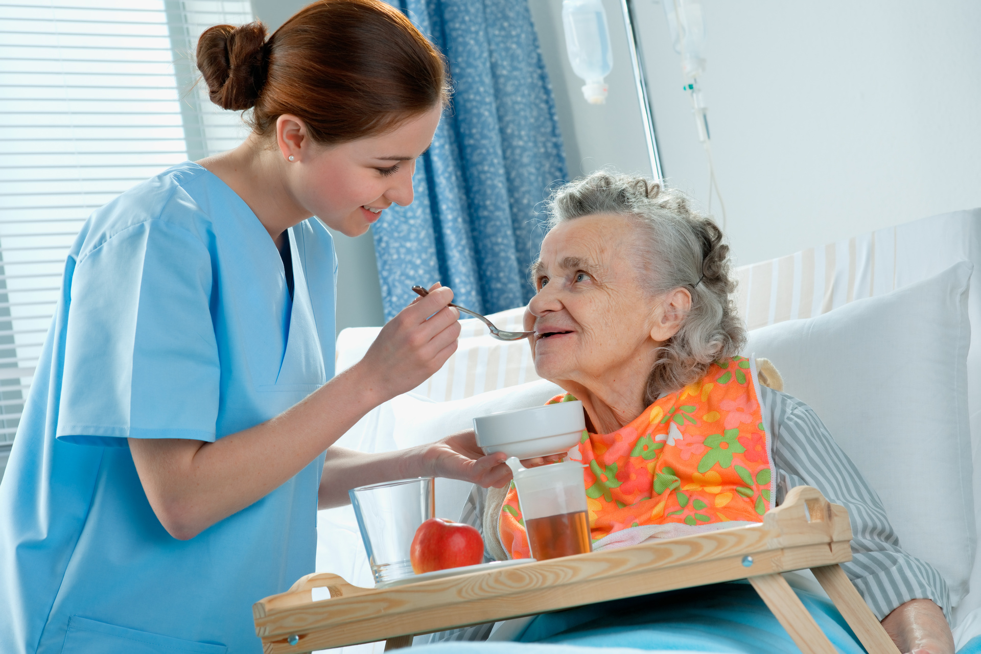 Nurse caring for Alzheimer patient