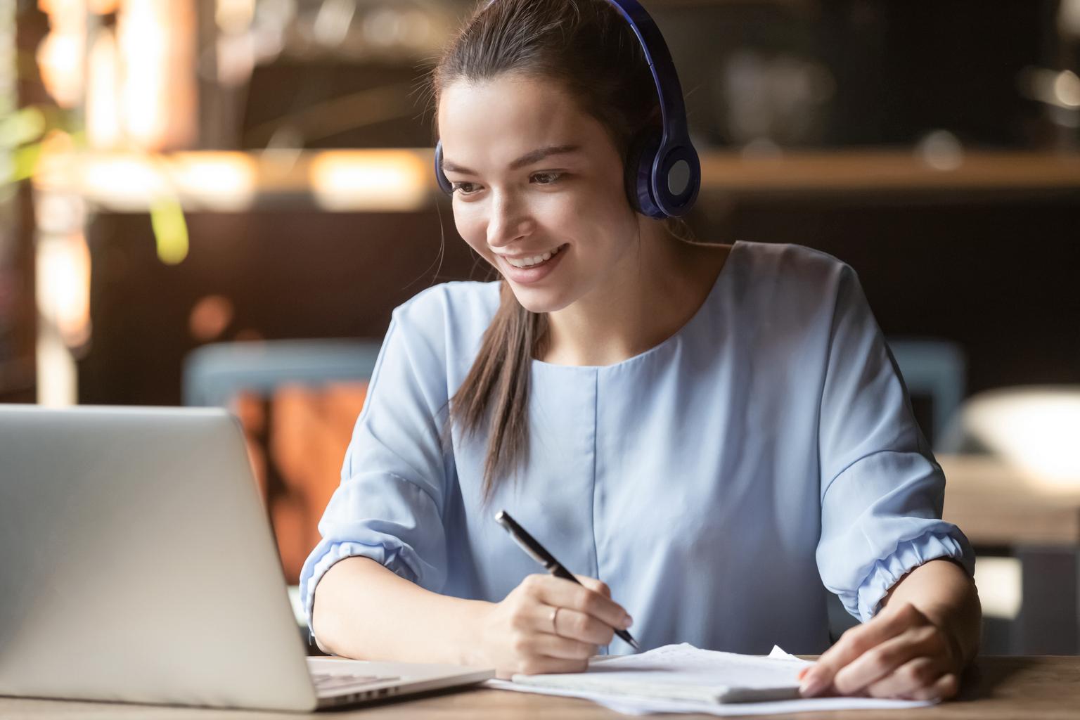 woman looking at  laptop