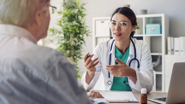 Doctor speaking with patient