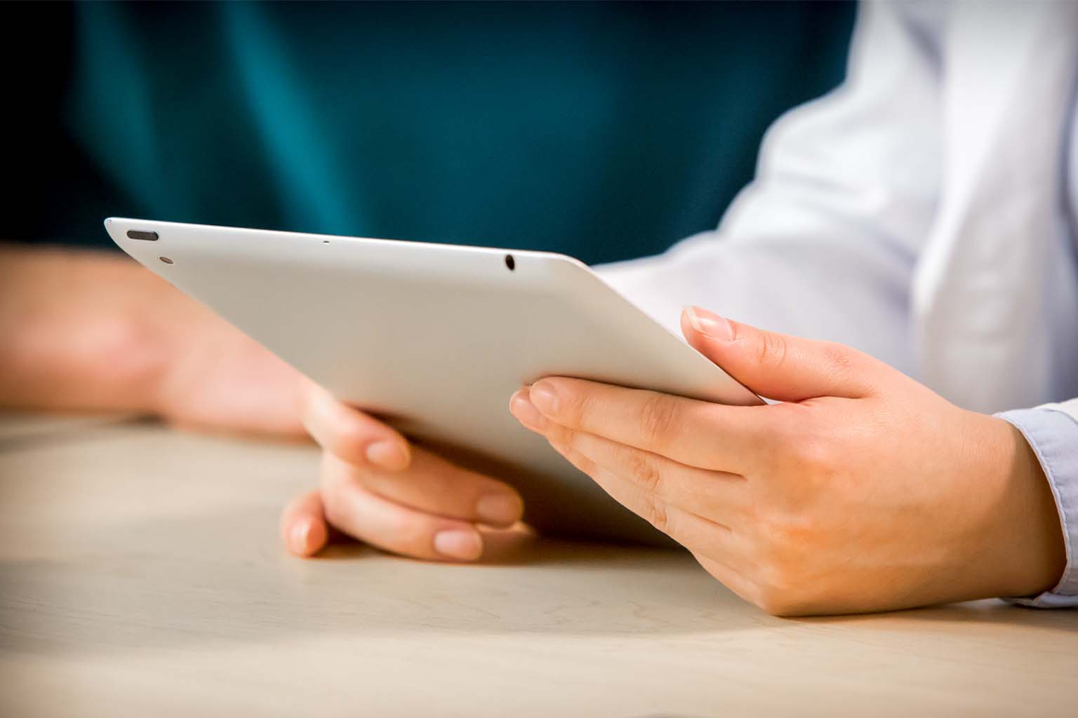 doctor hands holding a tablet