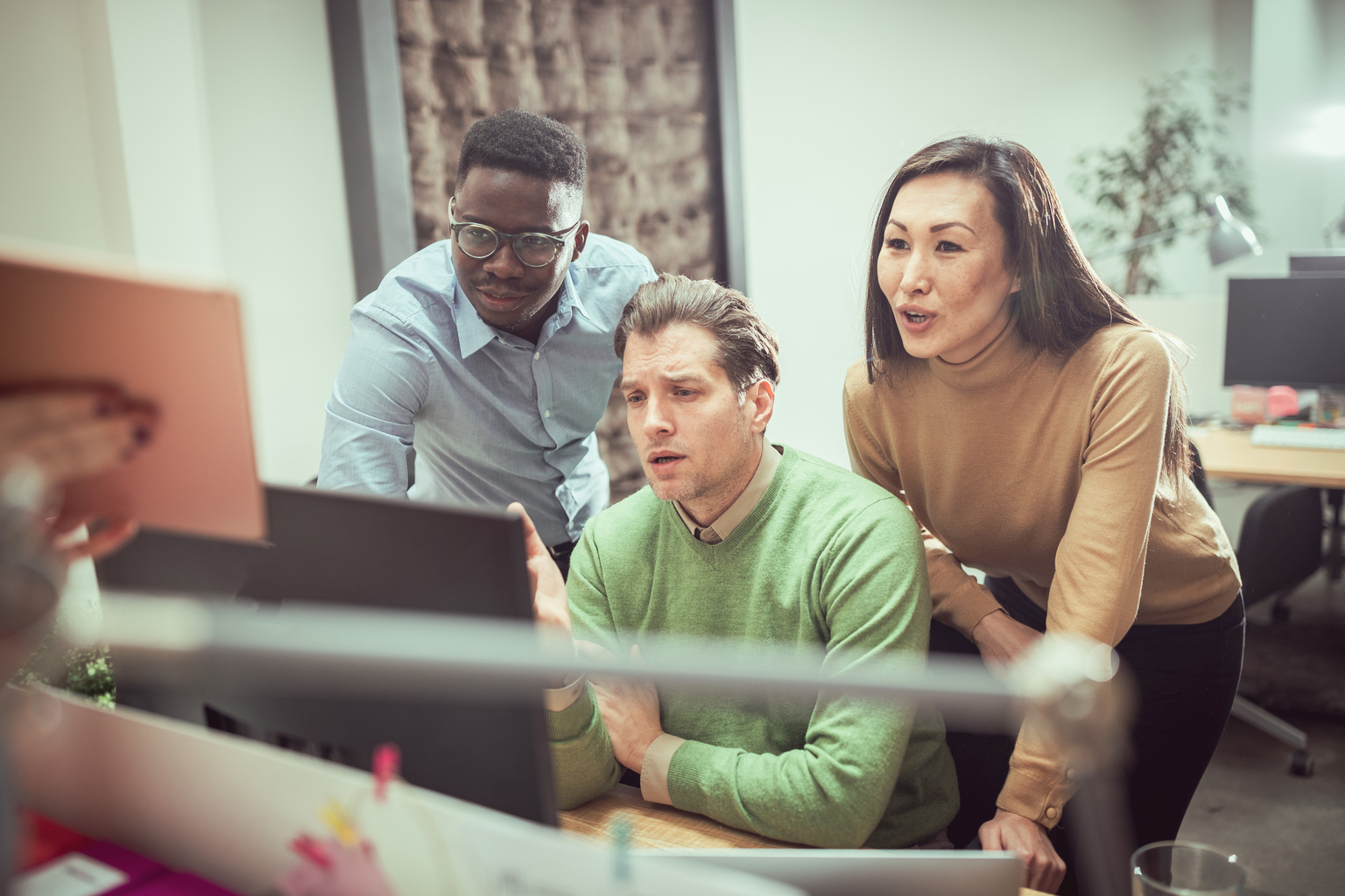 Multi-ethnic business people working together.