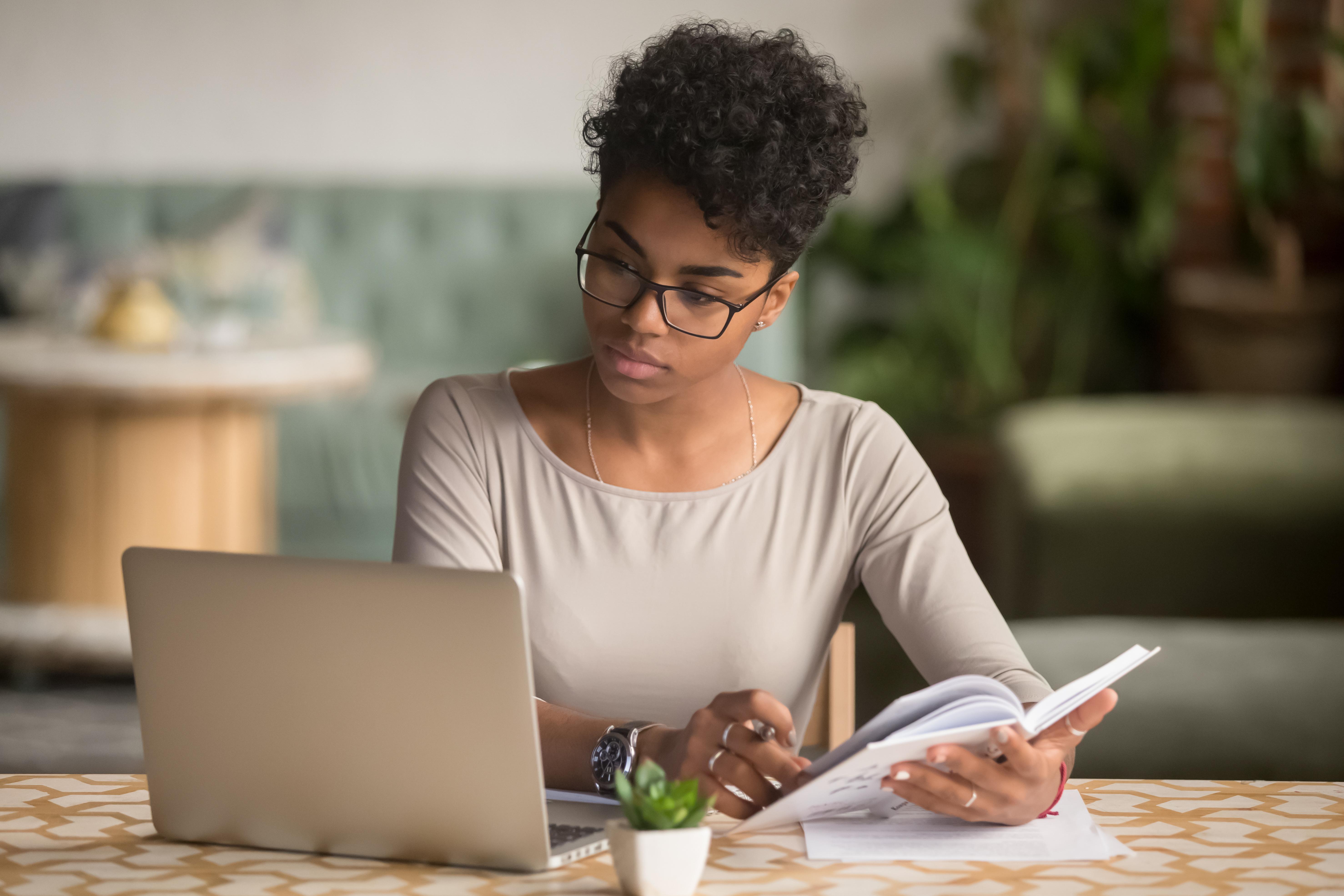 Woman studying a computer