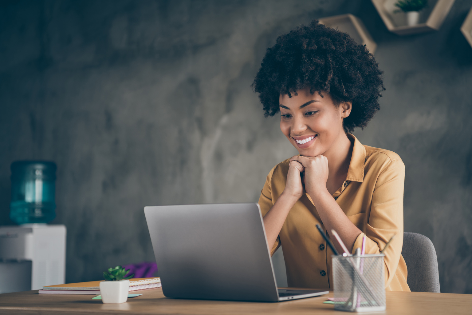 Woman enjoying training from CT Corporation's hCue staff