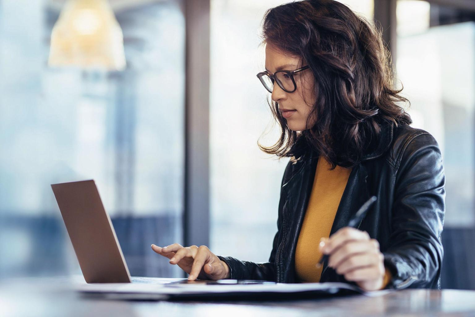 Wolters Kluwer woman working computer