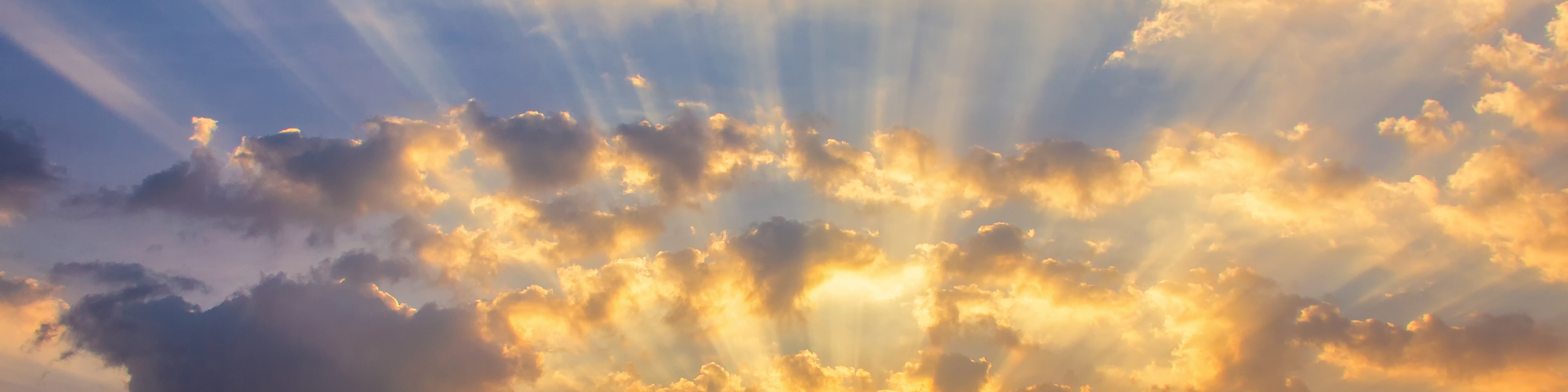 Colorful clouds on the dramatic sunset sky