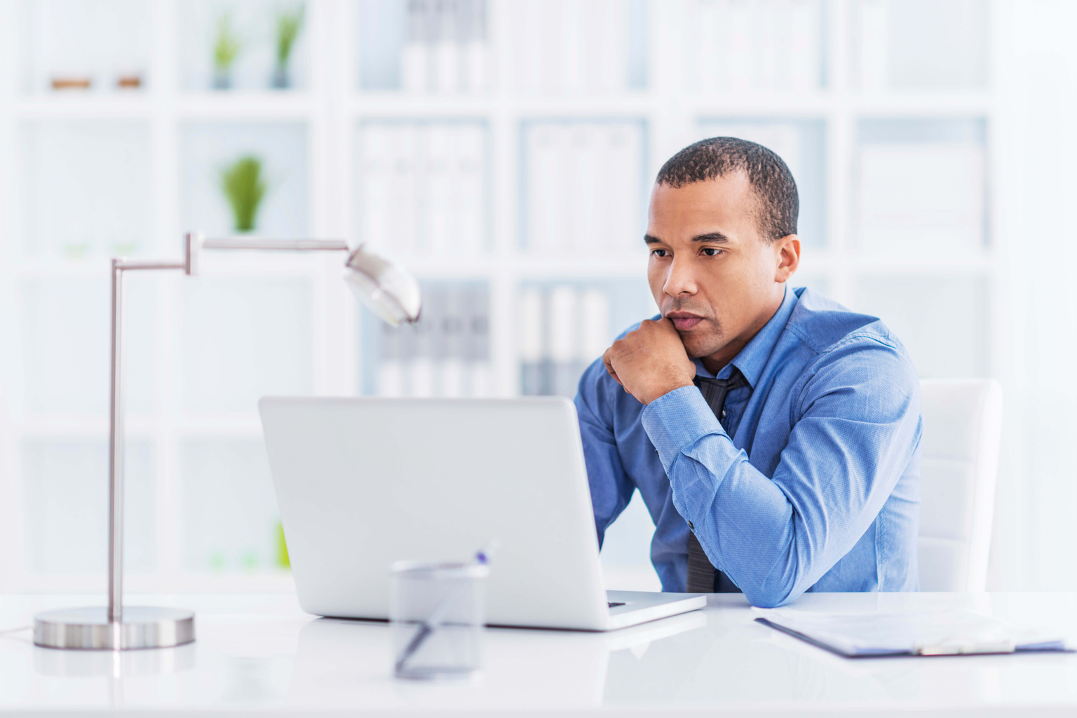 Clinician looking at a computer