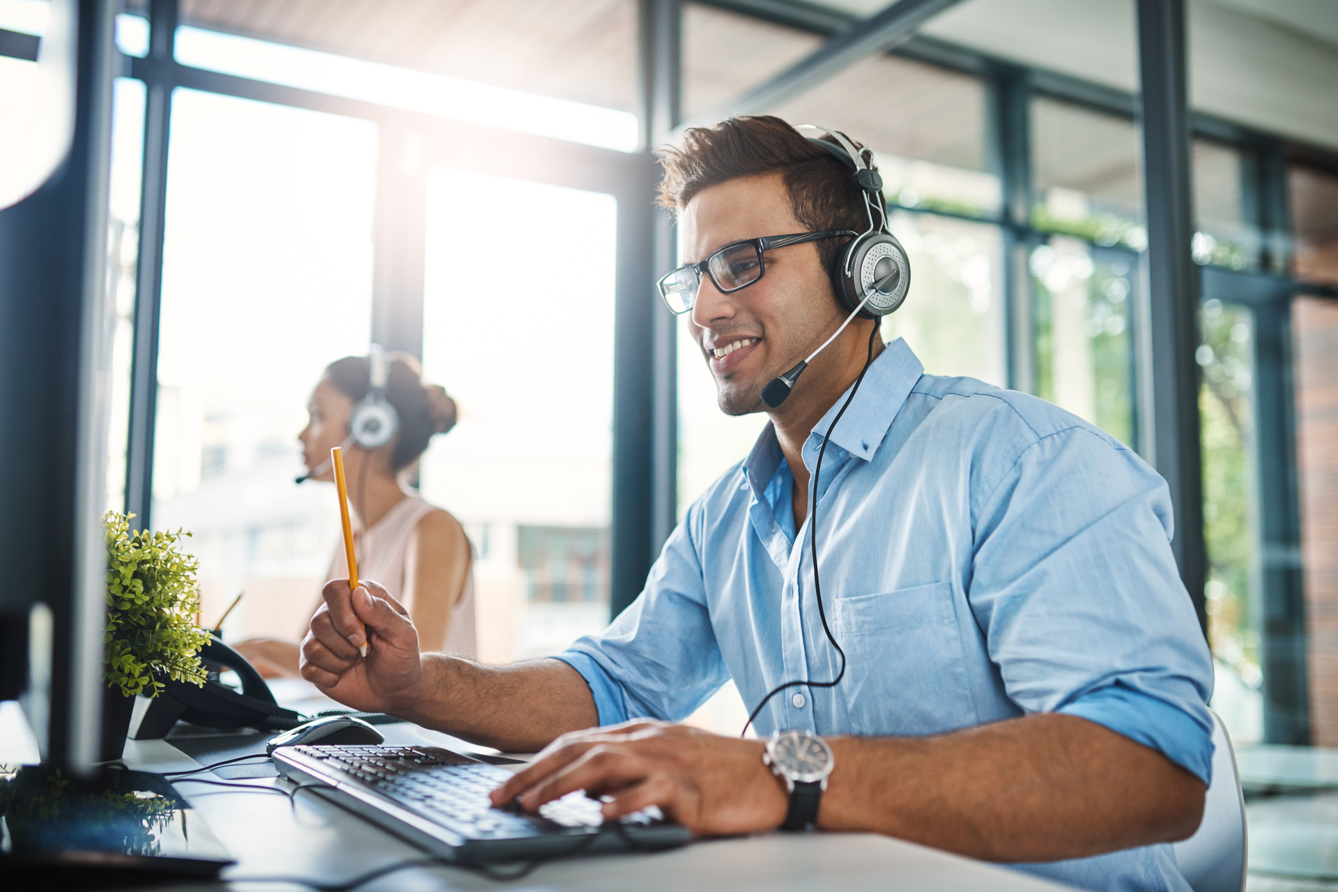 Call center employees answering questions