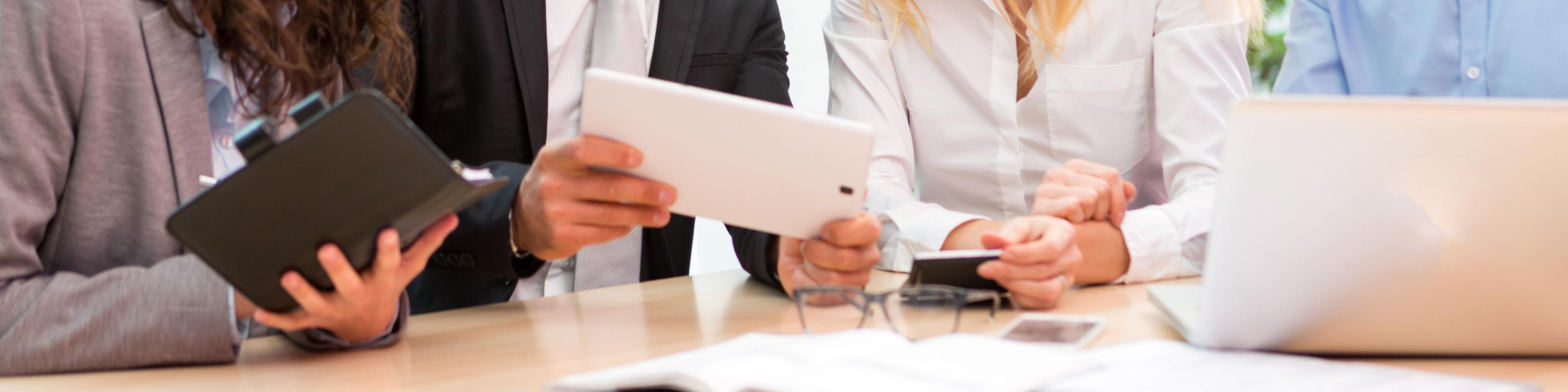 Group of business people working together at the office