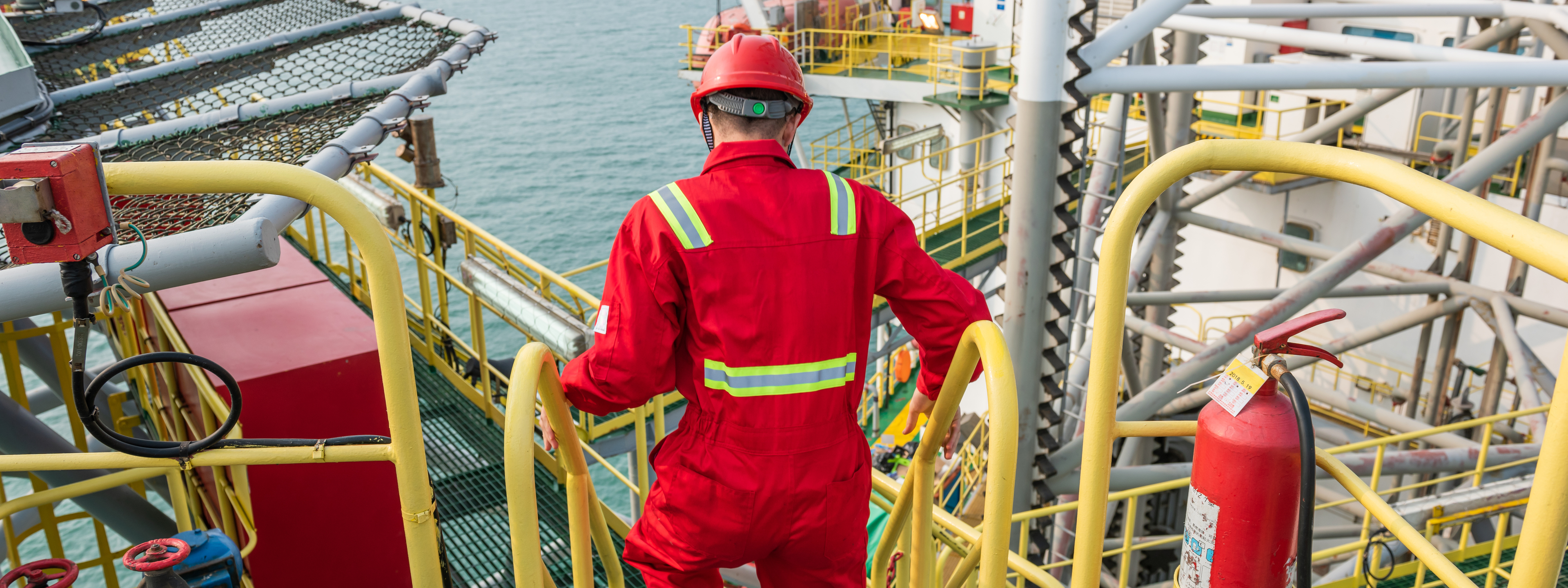 Young oil worker on offshore oil rig