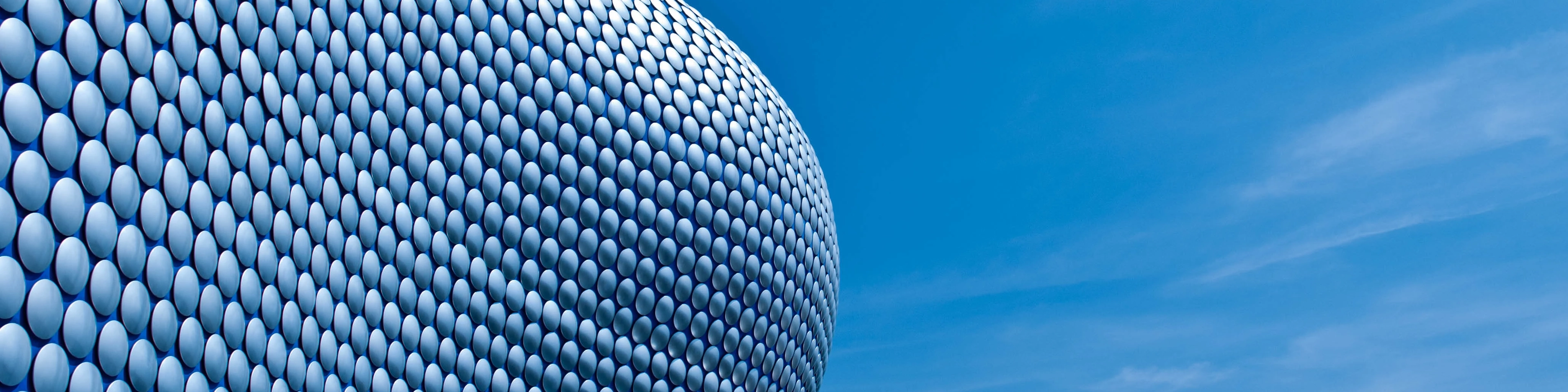 Close-up of modern building against blue sky, Birmingham, USA,