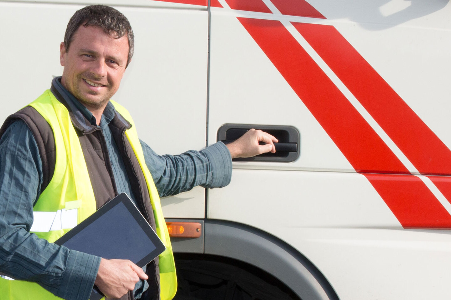 Man standing in front of truck