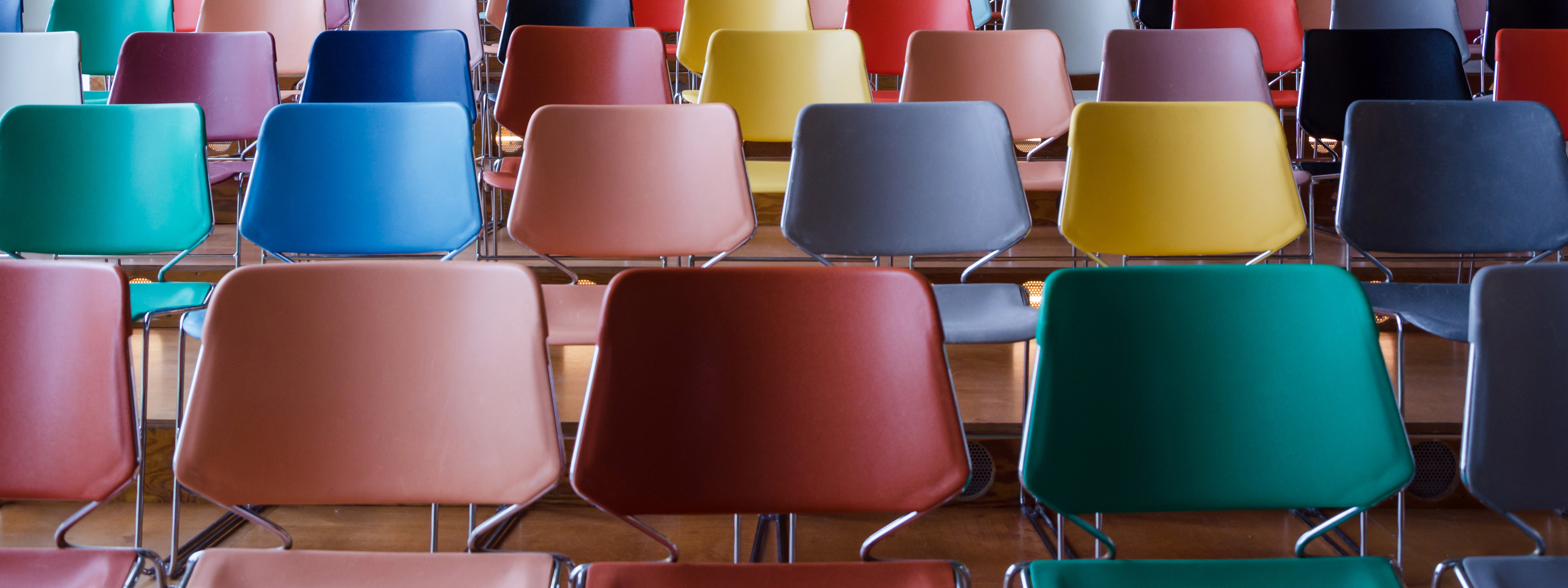 Rows of colorful empty chairs