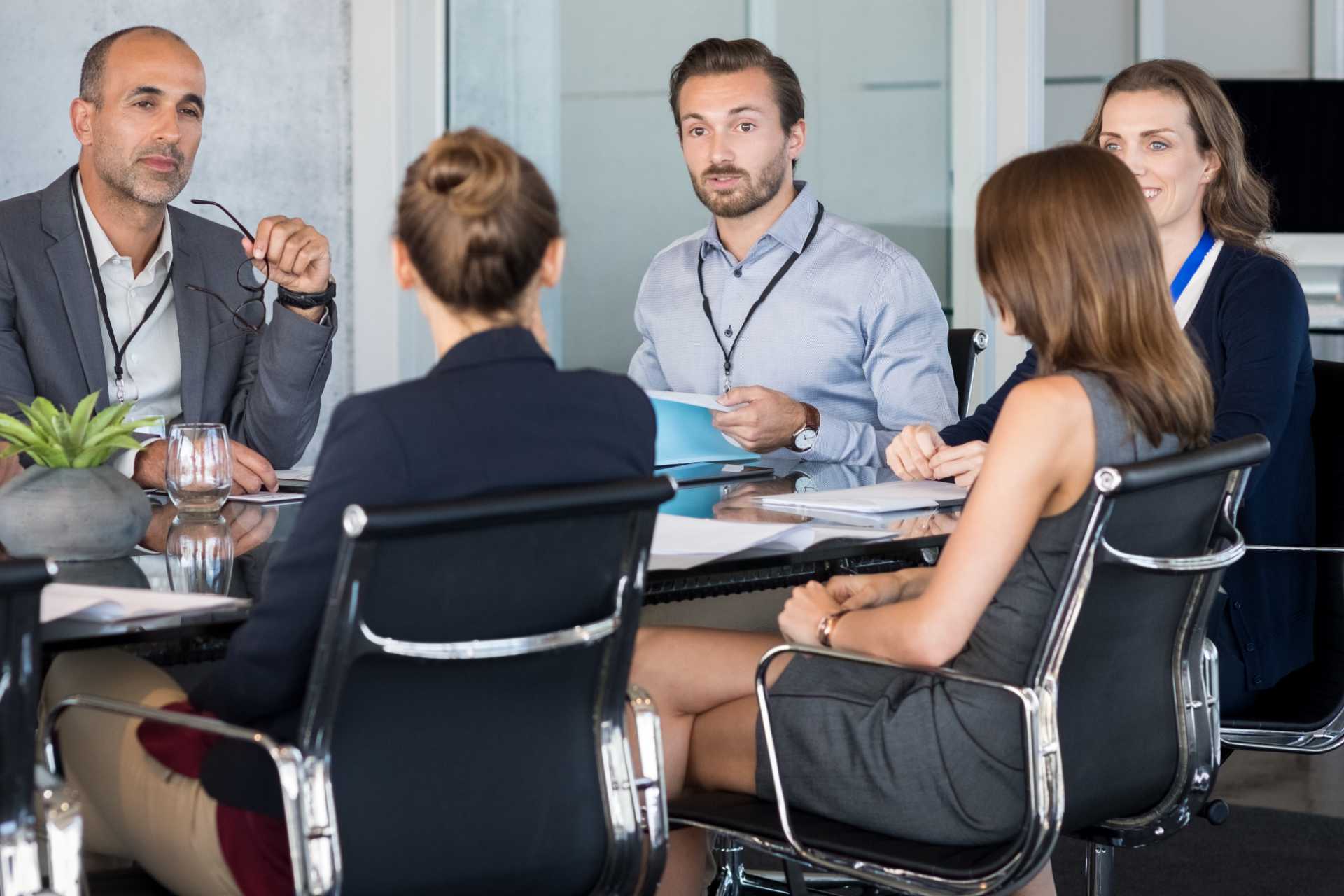 Group meets at office table