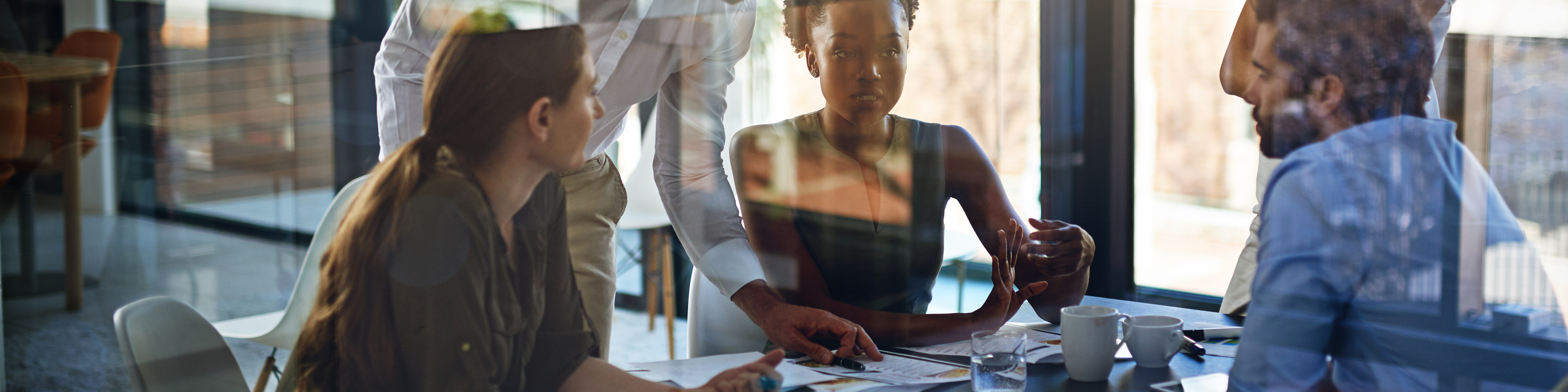  group of businesspeople having a meeting