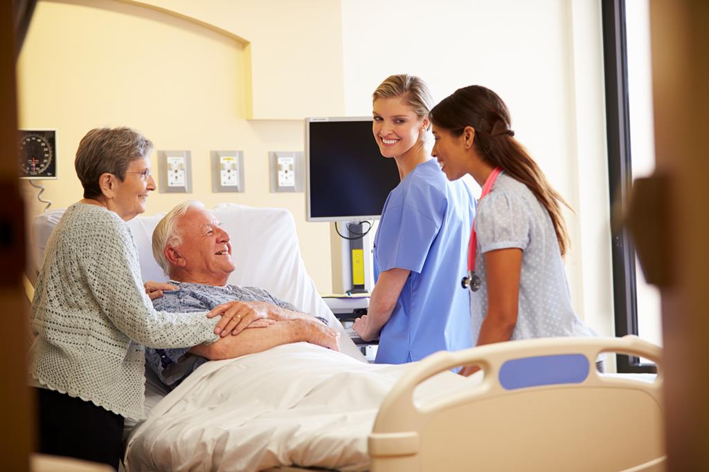 two-nurses-patient-family image