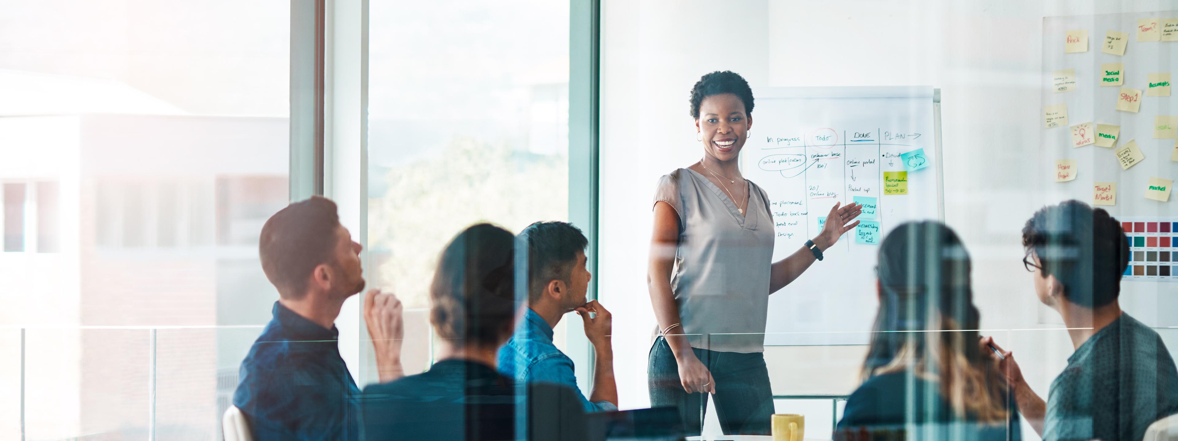 Shot of a group of business people having a meeting in a modern office