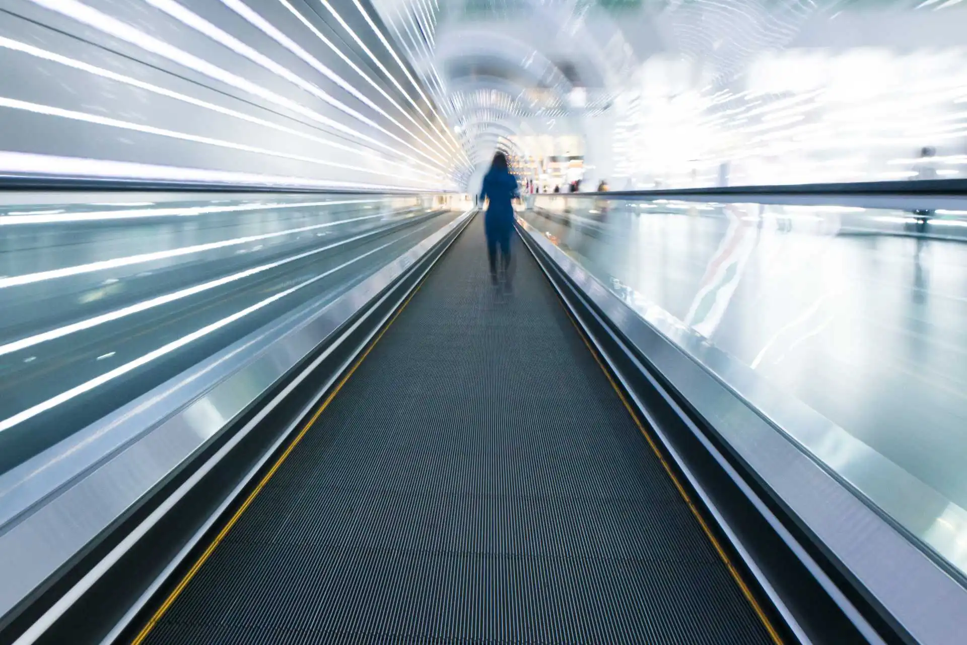 Woman in high tech walkway