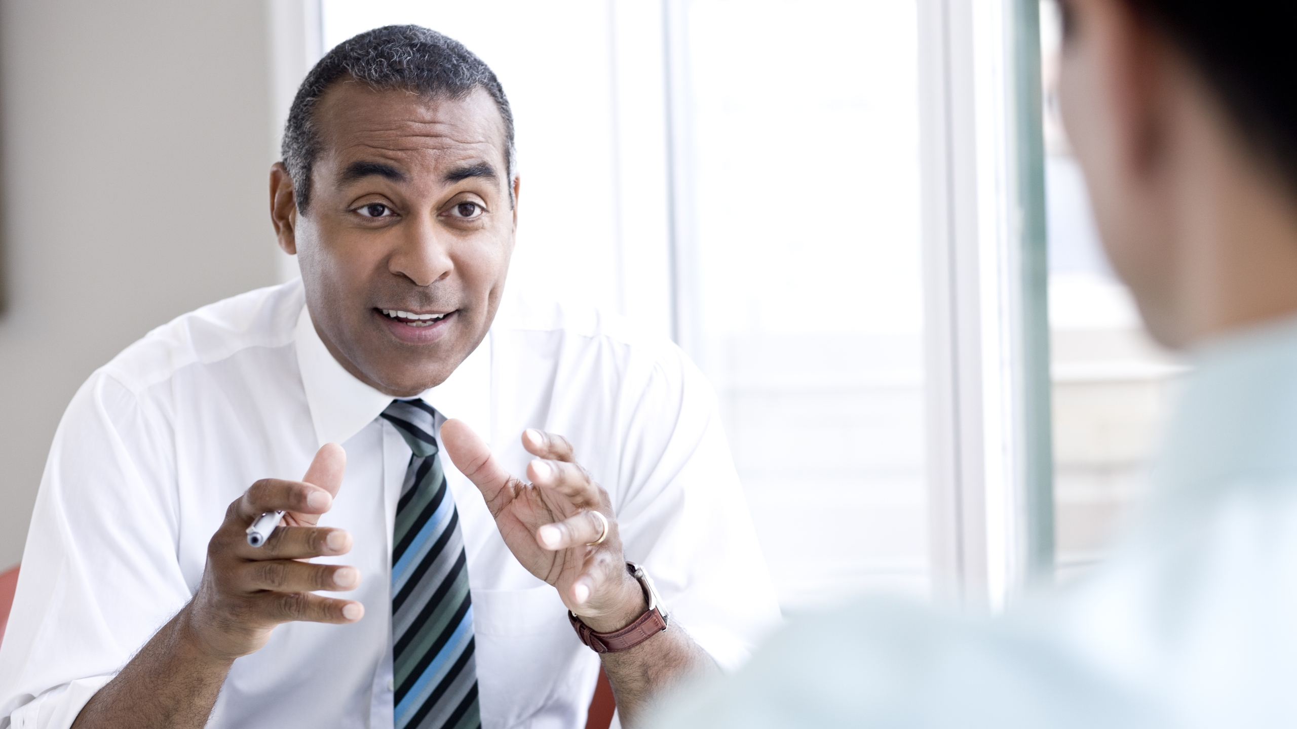 Businessman talking and gesturing