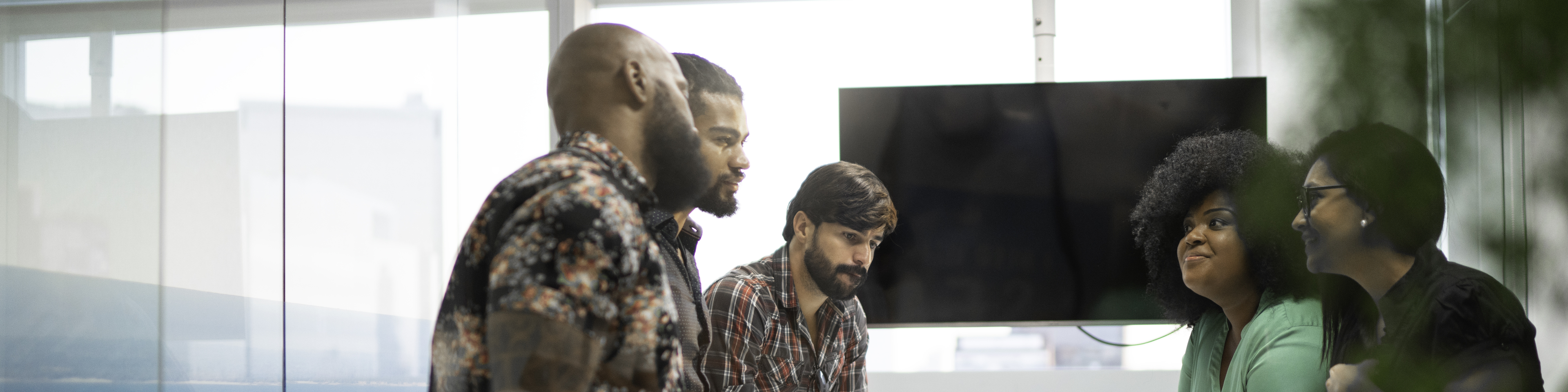 Business team discussing plans during business meeting