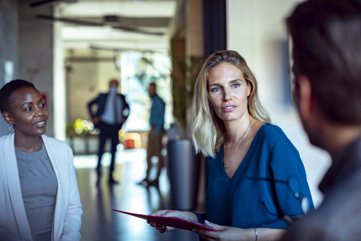 Customers having a meeting in the lobby