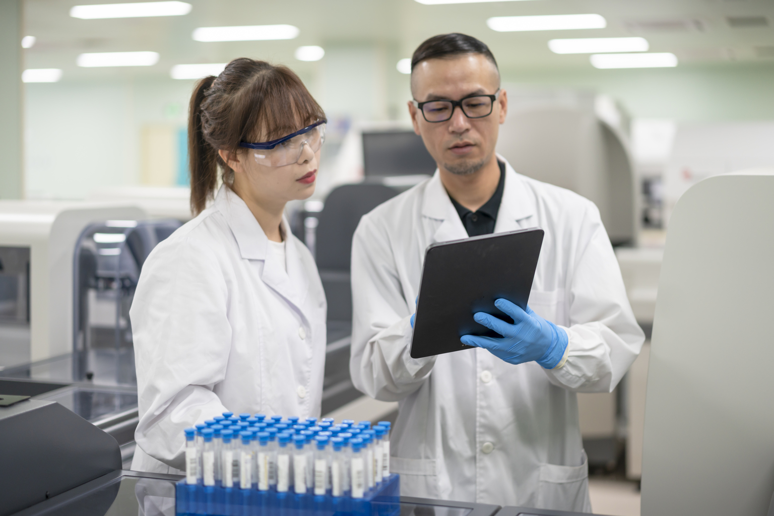 Two young doctors were discussing in the lab