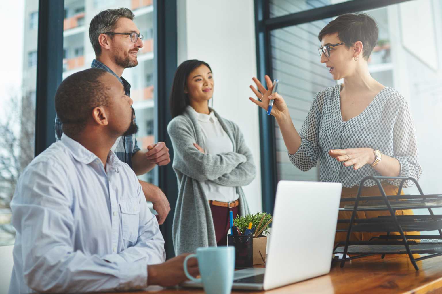 Woman leads a group meeting