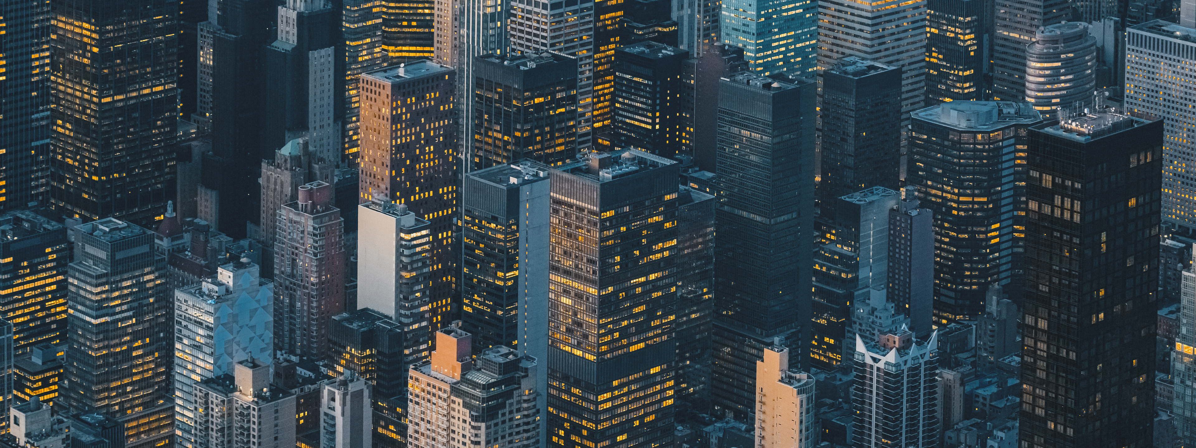 Aerial view of New York City skyline at sunset,