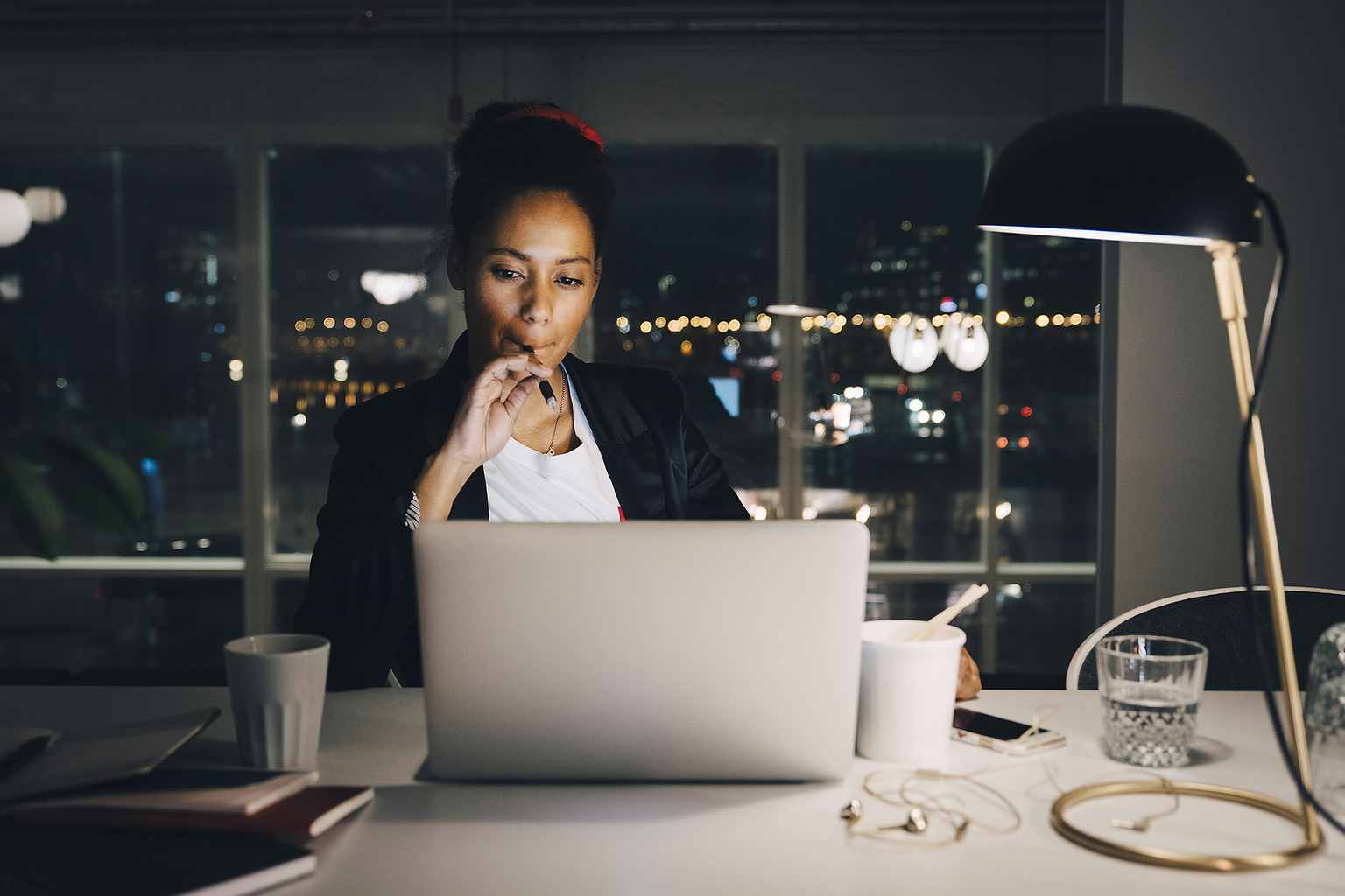 businesswoman burning the midnight oil