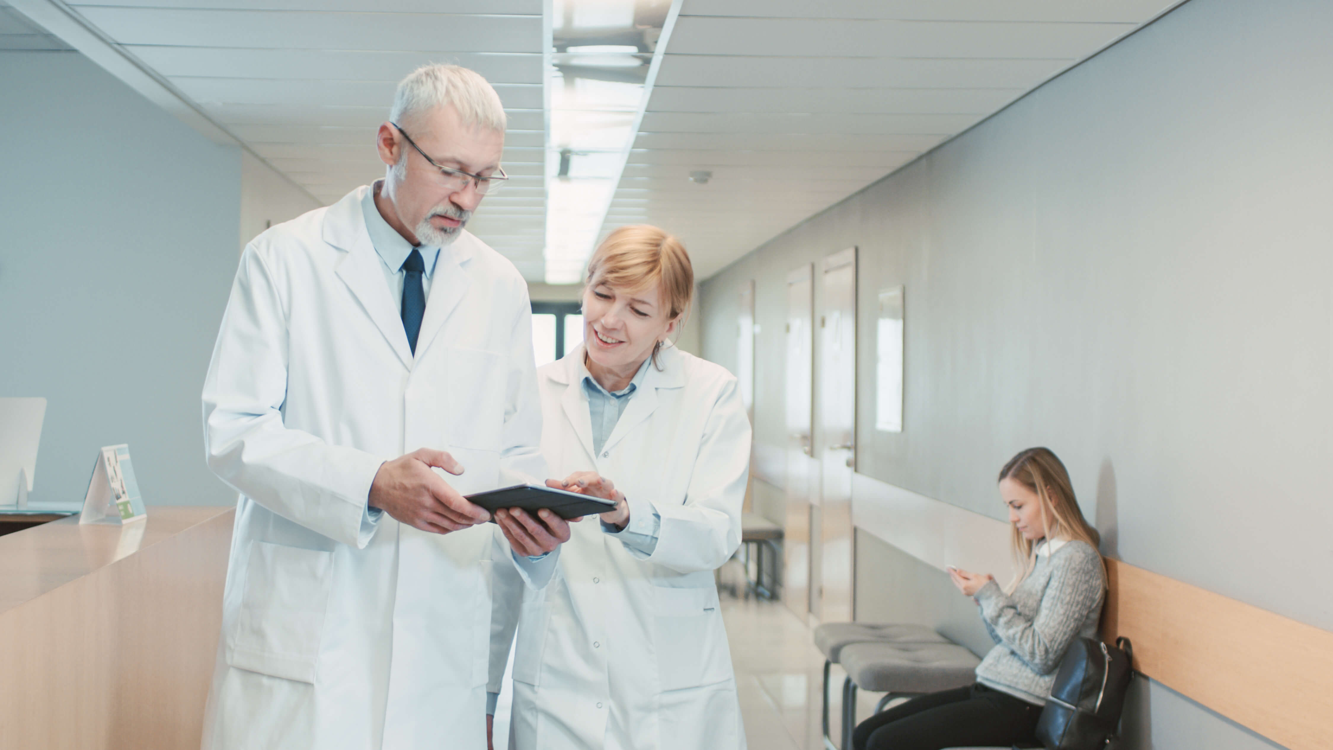 Two clinicians walking