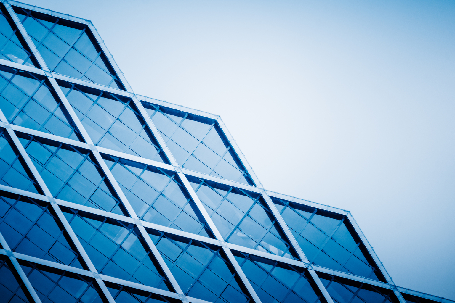 detail of modern glass building,blue toned.