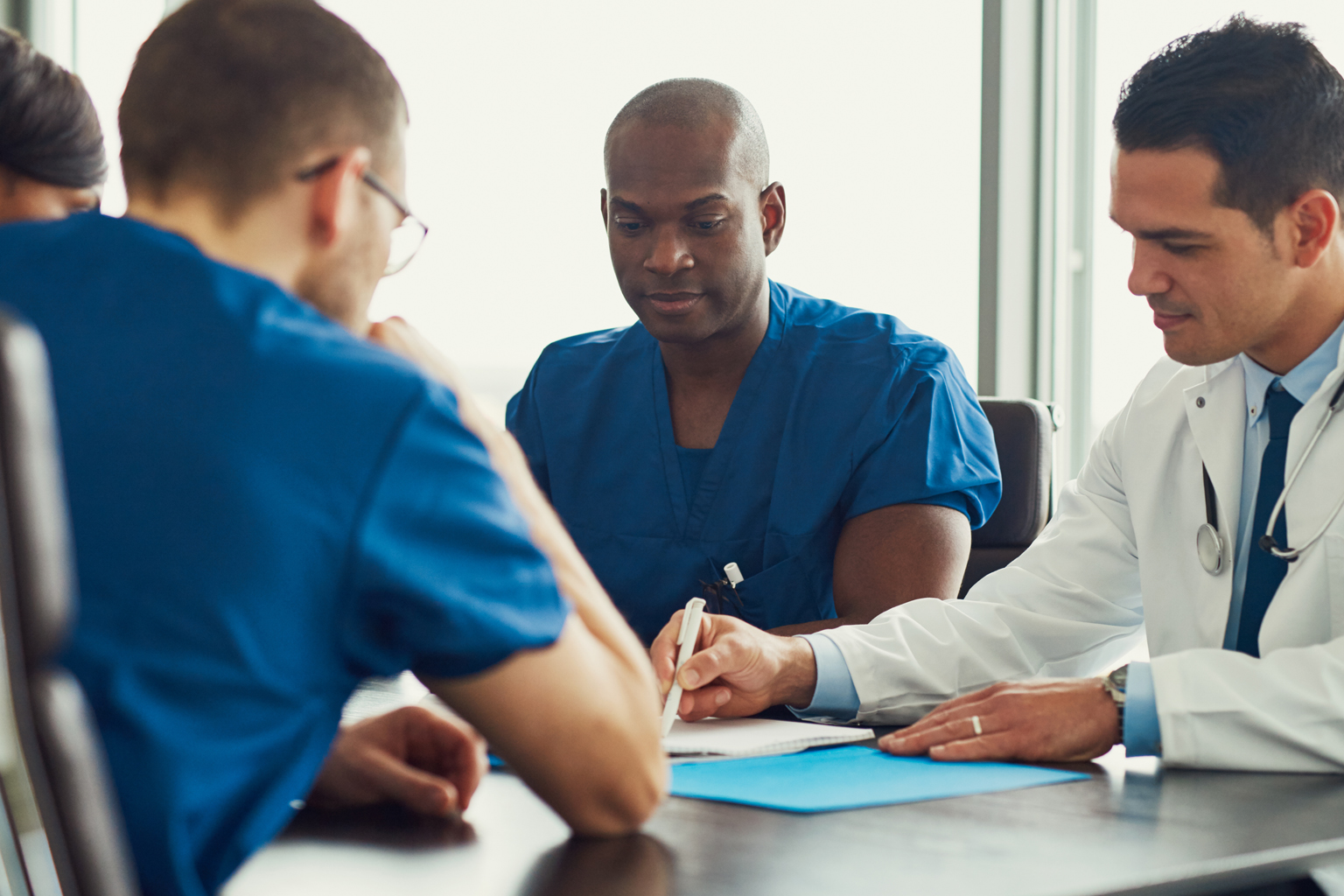 Group of nurses and doctors in medical staff meeting