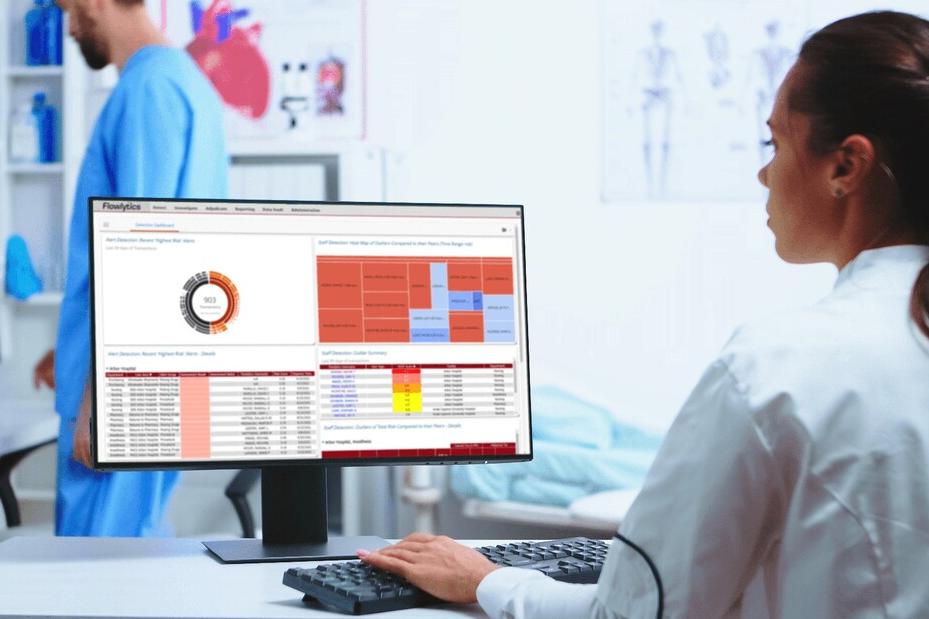 Pharmacist using the AI-powered Flowlytics dashboard